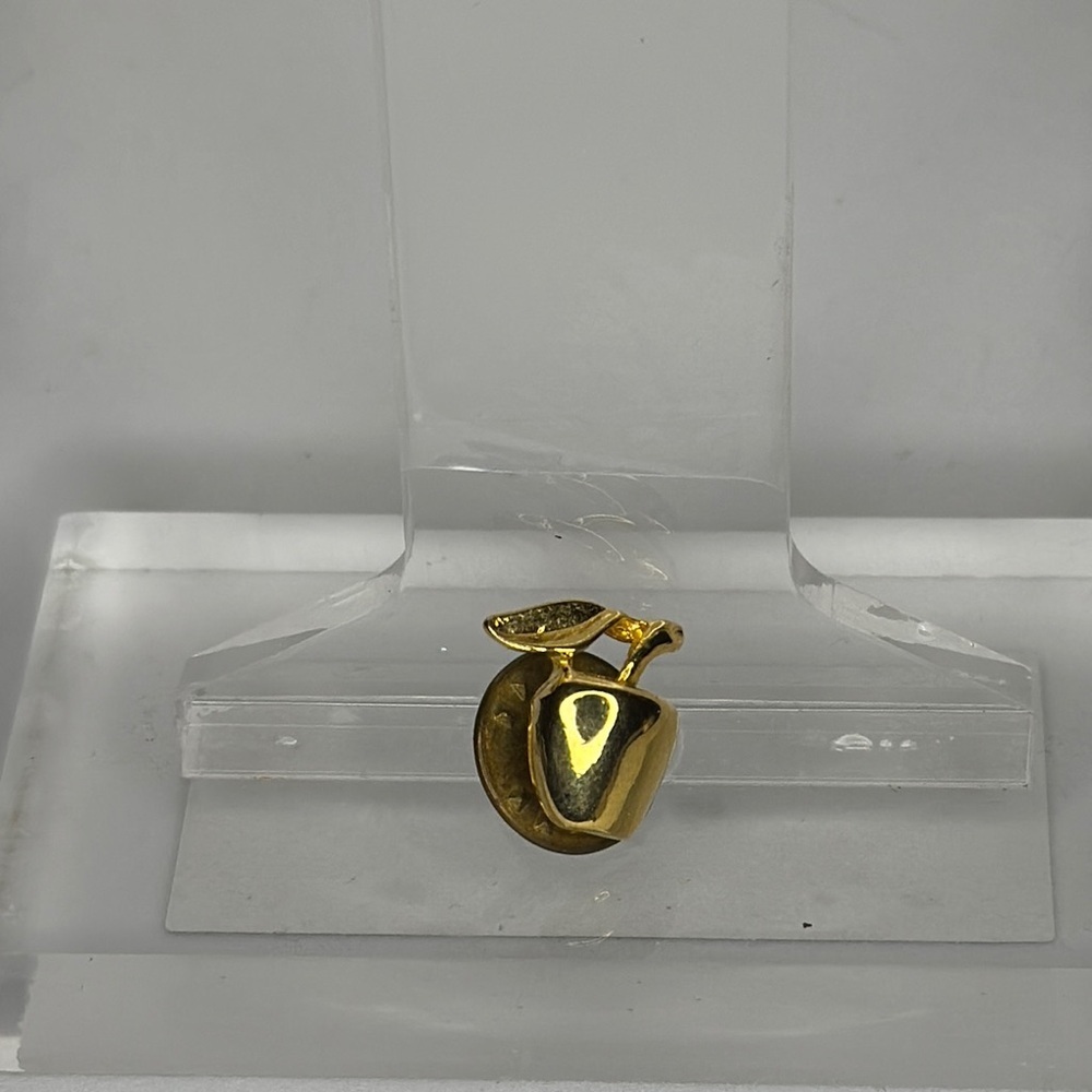 Elegant Gold V-Shaped Brooch